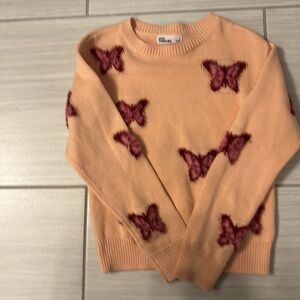 Epic Threads peach colored girls sweater with burgundy butterflies. Size 6